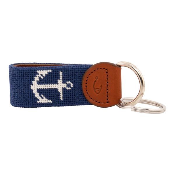 Hand-stitched needlepoint keychain, ship's anchor design in white on both sides with navy blue background high-quality leather and cotton thread, stainless steel D-ring and keyring.