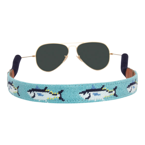 Back view bluefin tuna themed needlepoint sunglass strap showing a bluefin tuna design against a sea blue background with sturdy cotton covered silicone ear connectors and a soft leather backing