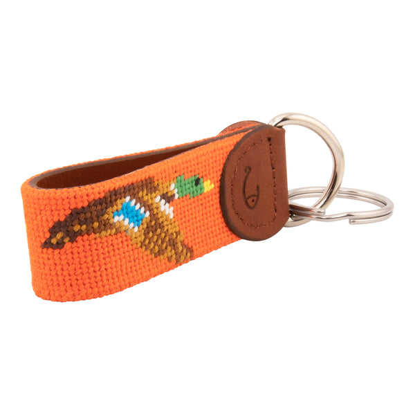 Hand-stitched duck needlepoint keychain showing a mallard drake on both sides against a blaze orange background and leather backing.  Stainless steel D-ring and keyring.