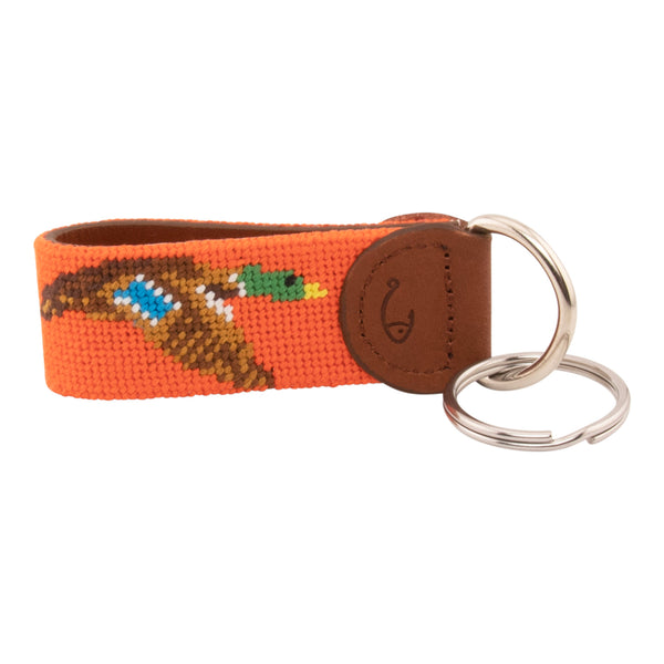 Hand-stitched duck needlepoint keychain showing a mallard drake on both sides against a blaze orange background and leather backing.  Stainless steel D-ring and keyring.