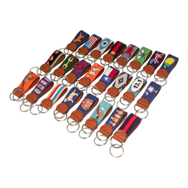 Huck Venture Needlepoint Keychain collection showing all handmade needlepoint key fobs in our catalog