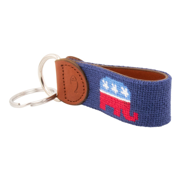 needlepoint key fob with Republican elephant design against a navy blue background, same image on both sides, hand-stitched, leather backing, stainless steel keyring