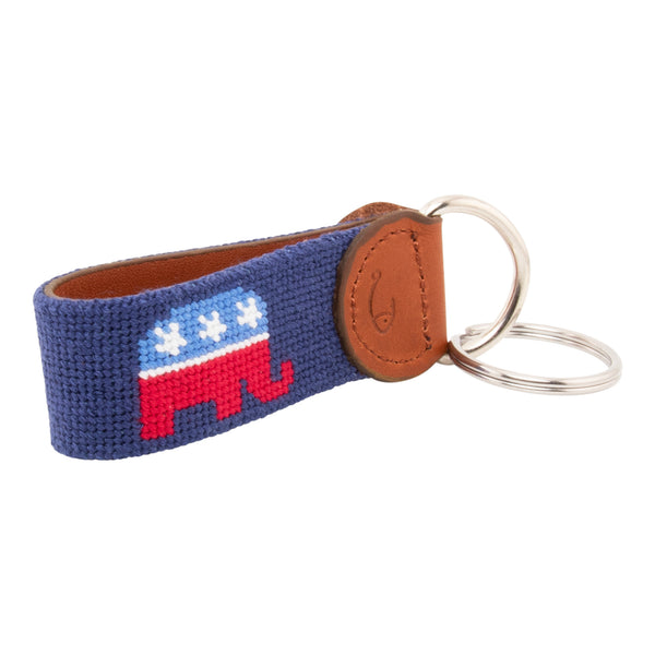 needlepoint key fob with Republican elephant design against a navy blue background, same image on both sides, hand-stitched, leather backing, stainless steel keyring